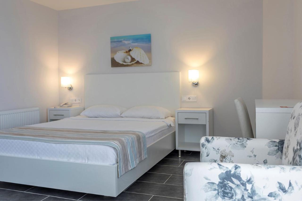 Troas Beach Hotel Tavakli Bagian luar foto