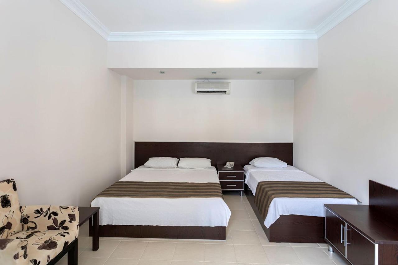 Troas Beach Hotel Tavakli Bagian luar foto